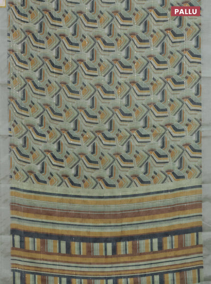 Linen cotton saree pastel green with allover geometric prints & sequin work and silver zari woven border