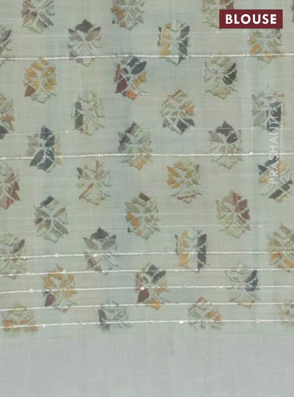 Linen cotton saree pastel green with allover geometric prints & sequin work and silver zari woven border