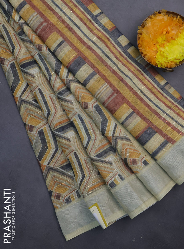 Linen cotton saree pale yellow with allover geometric prints & sequin work and silver zari woven border