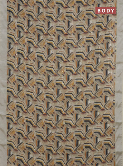 Linen cotton saree pale yellow with allover geometric prints & sequin work and silver zari woven border