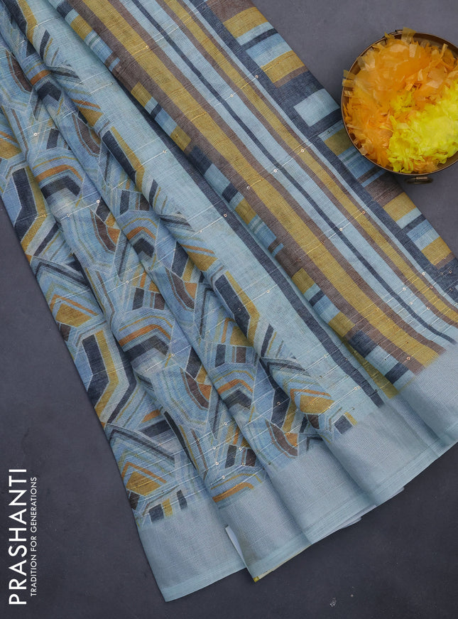 Linen cotton saree pastel blue with allover geometric prints & sequin work and silver zari woven border