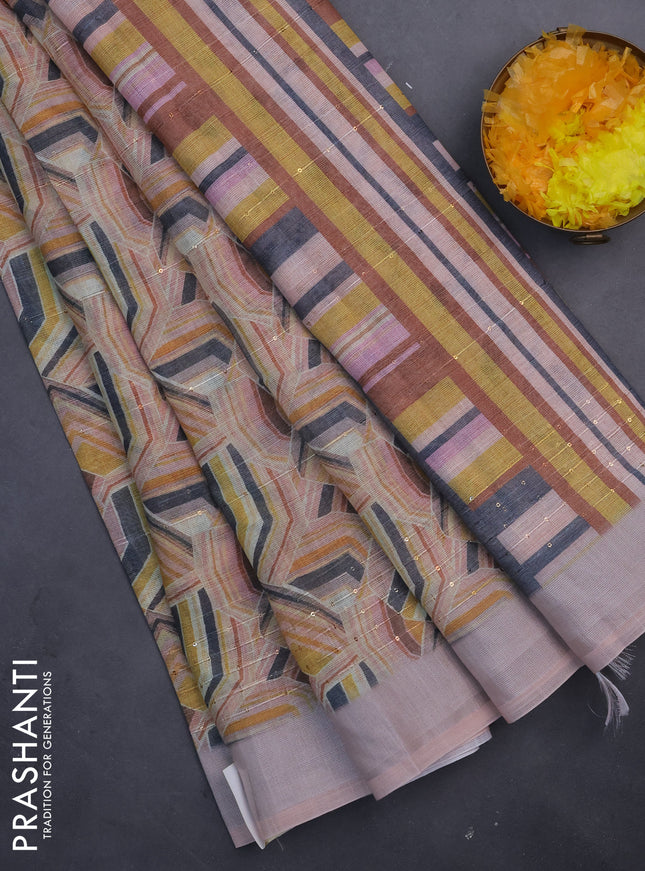 Linen cotton saree multi colour and peach shade with allover geometric prints & sequin work and silver zari woven border