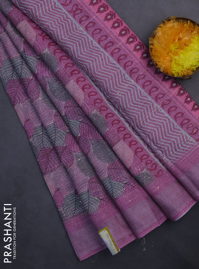Linen cotton saree mauve pink with allover leaf prints & sequin work and silver zari woven border