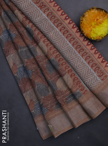 Linen cotton saree brown shade with allover leaf prints & sequin work and silver zari woven border