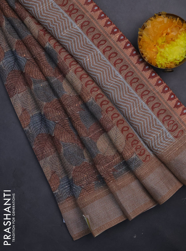Linen cotton saree brown shade with allover leaf prints & sequin work and silver zari woven border