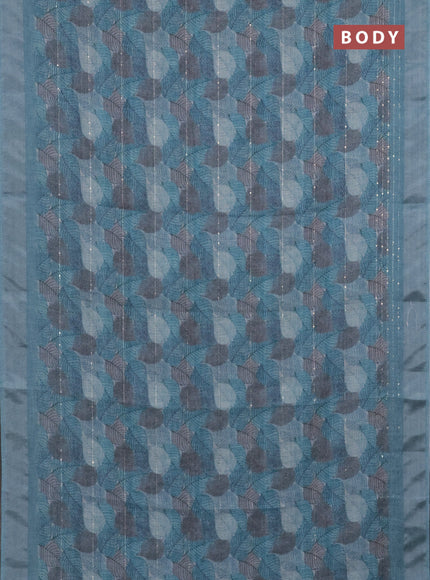 Linen cotton saree teal blue with allover leaf prints & sequin work and silver zari woven border