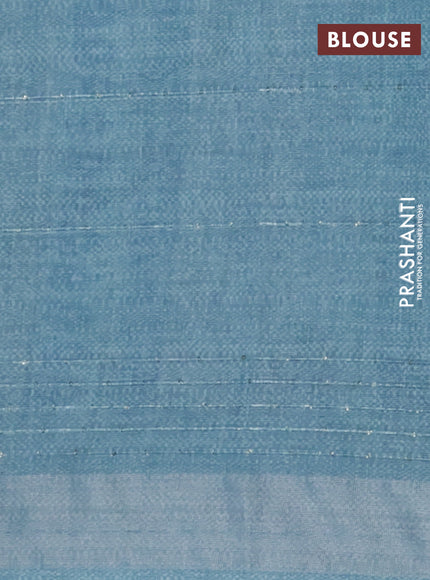 Linen cotton saree teal blue with allover leaf prints & sequin work and silver zari woven border