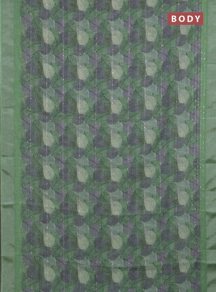 Linen cotton saree light green with allover leaf prints & sequin work and silver zari woven border