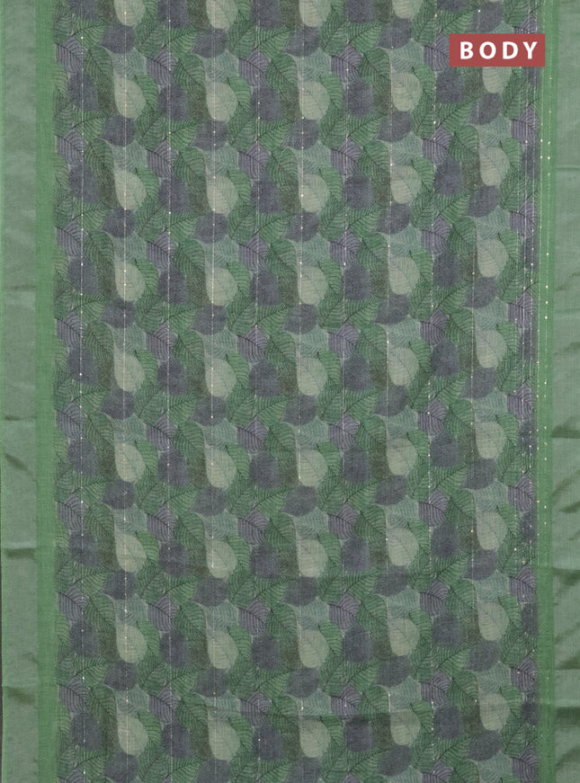 Linen cotton saree light green with allover leaf prints & sequin work and silver zari woven border