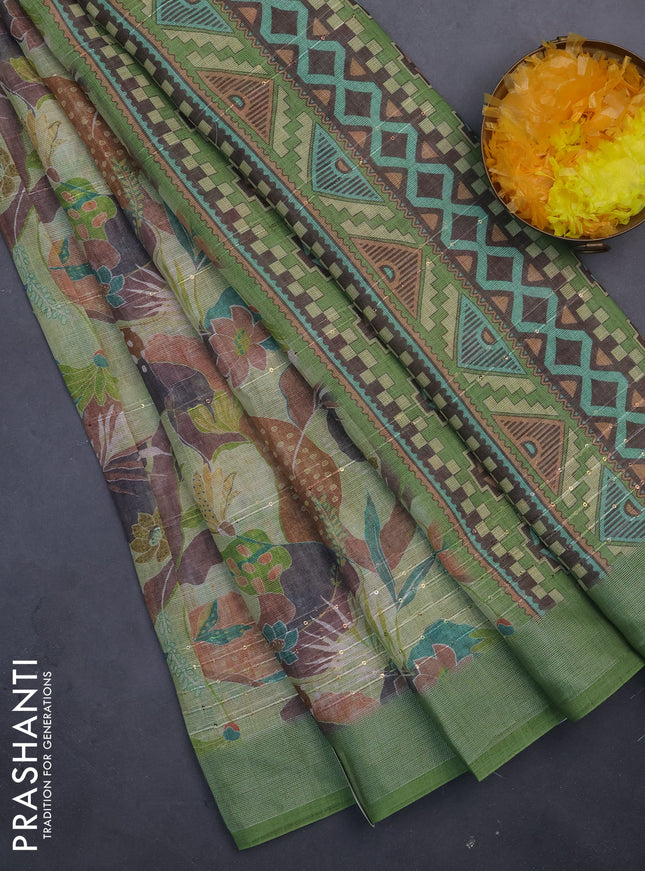 Linen cotton saree light green with allover floral prints & sequin work and silver zari woven border