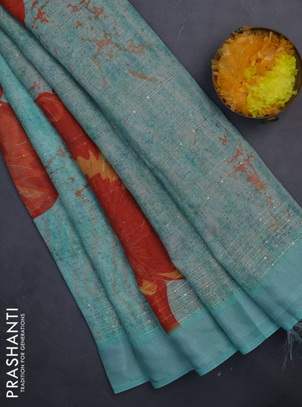 Linen cotton saree teal green with allover prints & sequin work and silver zari woven border