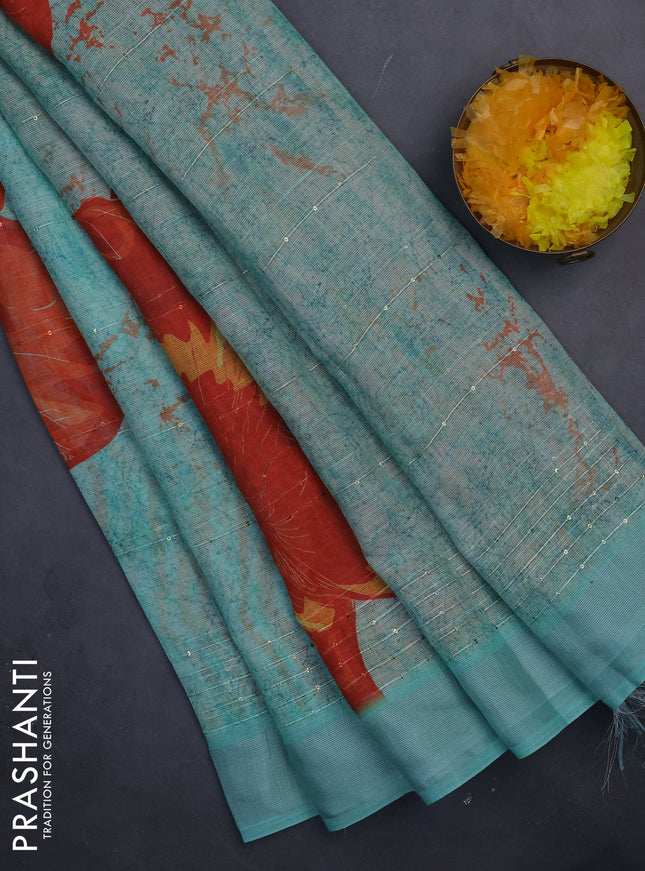 Linen cotton saree teal green with allover prints & sequin work and silver zari woven border
