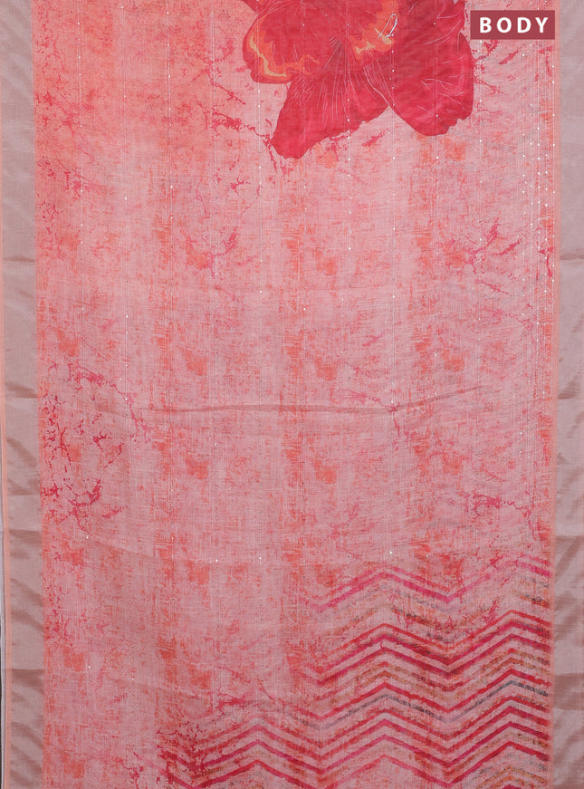 Linen cotton saree pale orange with allover prints & sequin work and silver zari woven border