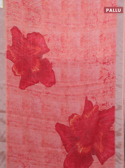 Linen cotton saree pale orange with allover prints & sequin work and silver zari woven border