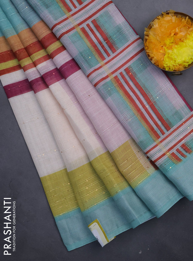 Linen cotton saree pastel green and off white with stripes pattern & sequin work and silver zari woven border