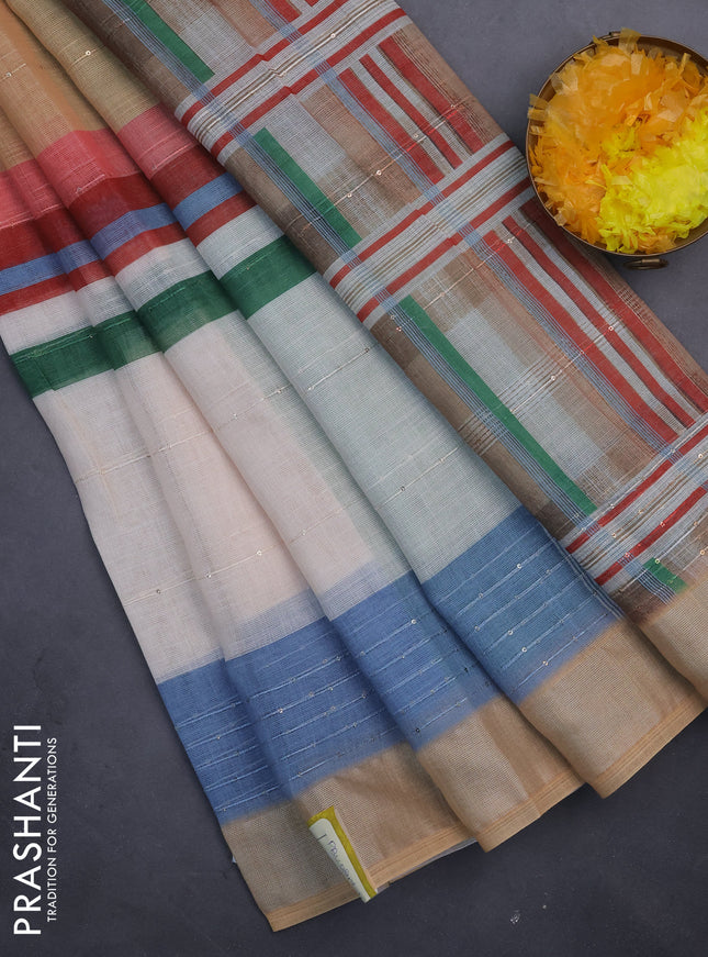 Linen cotton saree pale orange and off white with stripes pattern & sequin work and silver zari woven border