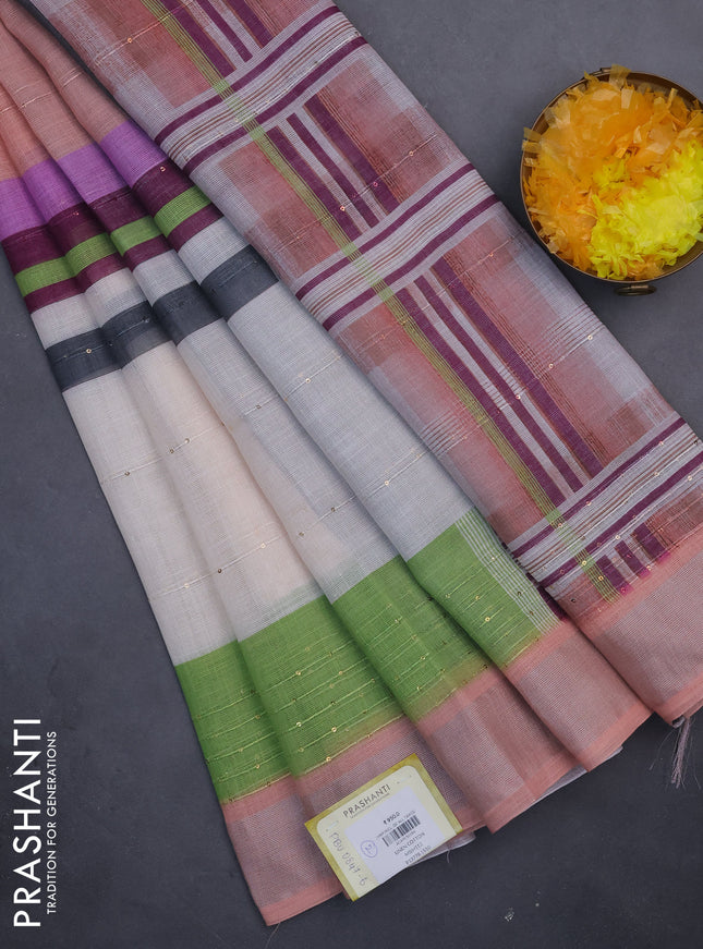 Linen cotton saree peach and off white with stripes pattern & sequin work and silver zari woven border