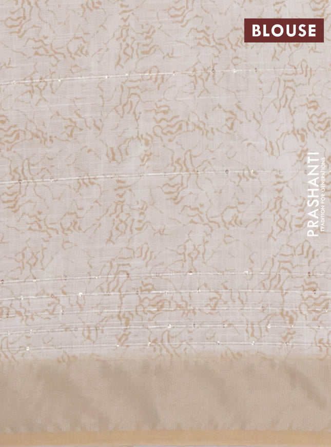 Linen cotton saree sandal with allover prints & sequin work and silver zari woven border