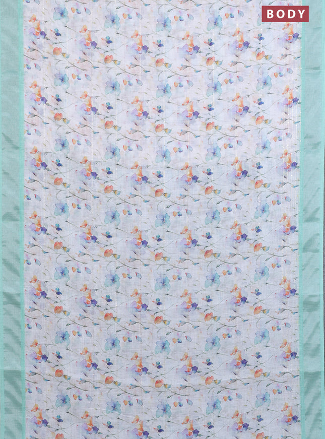 Linen cotton saree off white and teal green with allover floral prints & sequin work and silver zari woven border