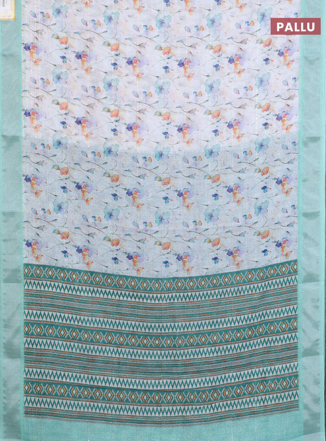 Linen cotton saree off white and teal green with allover floral prints & sequin work and silver zari woven border