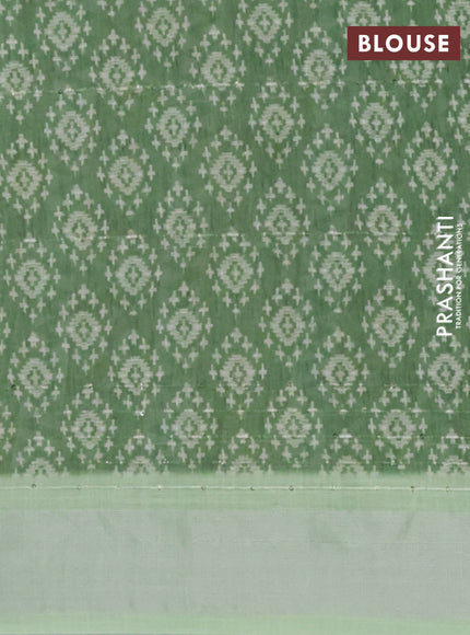 Linen cotton saree off white and light green with allover floral prints & sequin work and silver zari woven border