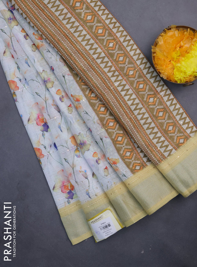 Linen cotton saree off white and pale yellow with allover floral prints & sequin work and silver zari woven border