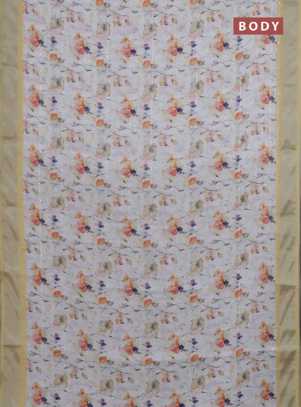 Linen cotton saree off white and pale yellow with allover floral prints & sequin work and silver zari woven border