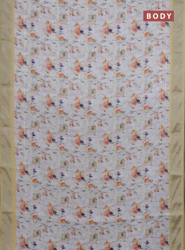 Linen cotton saree off white and pale yellow with allover floral prints & sequin work and silver zari woven border