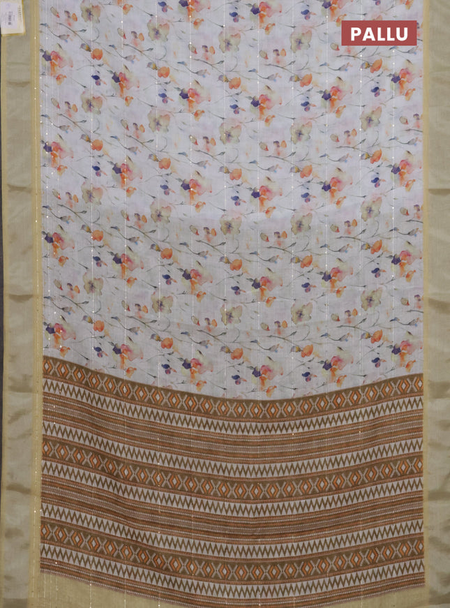 Linen cotton saree off white and pale yellow with allover floral prints & sequin work and silver zari woven border
