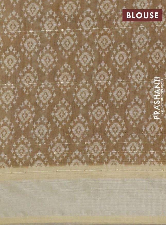 Linen cotton saree off white and pale yellow with allover floral prints & sequin work and silver zari woven border