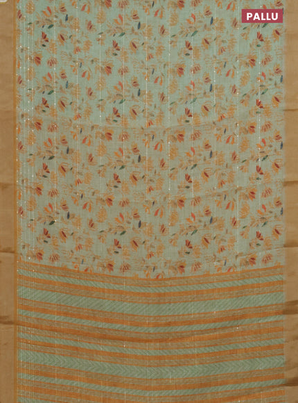 Linen cotton saree light green and mustard shade with allover prints & sequin work and silver zari woven border