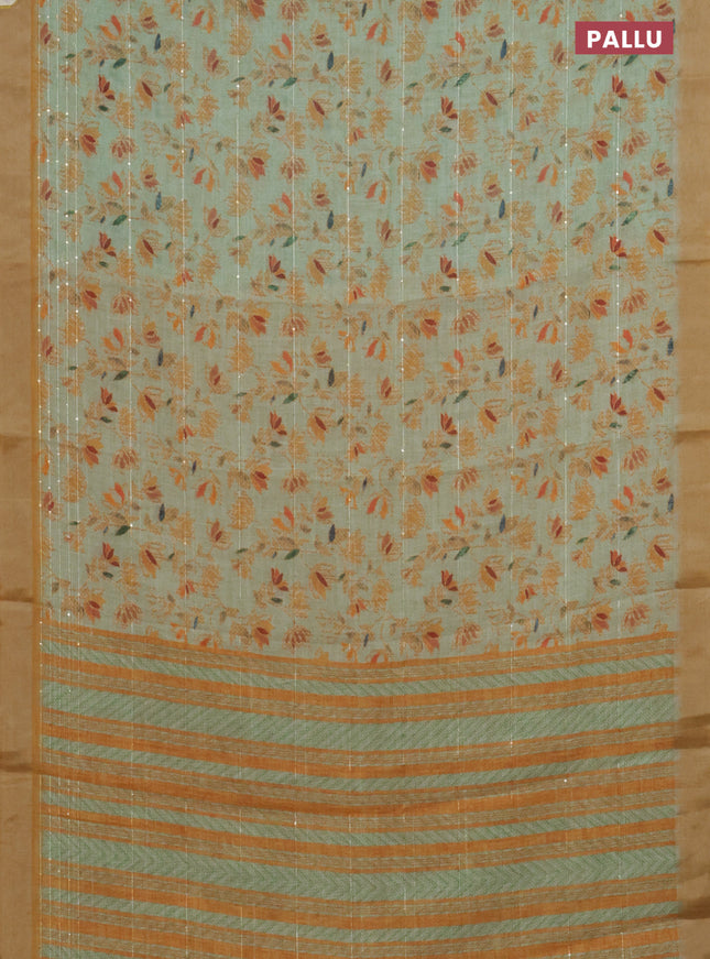 Linen cotton saree light green and mustard shade with allover prints & sequin work and silver zari woven border
