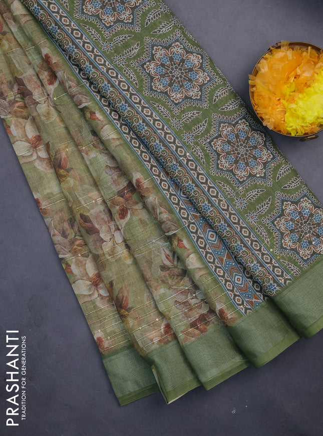 Linen cotton saree mehendi green with floral prints & sequin work and silver zari woven border