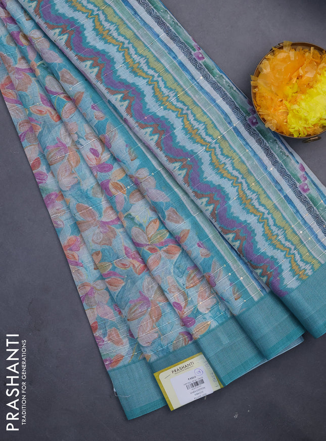 Linen cotton saree teal blue with floral prints & sequin work and silver zari woven border