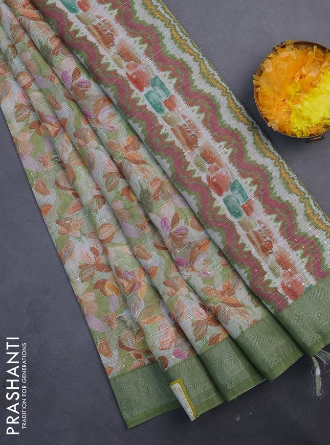 Linen cotton saree light green with floral prints & sequin work and silver zari woven border