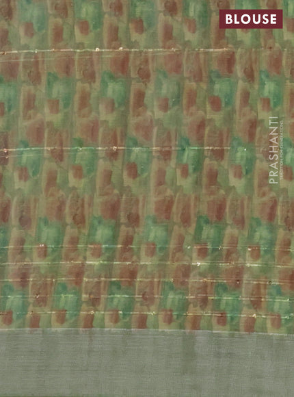 Linen cotton saree light green with floral prints & sequin work and silver zari woven border