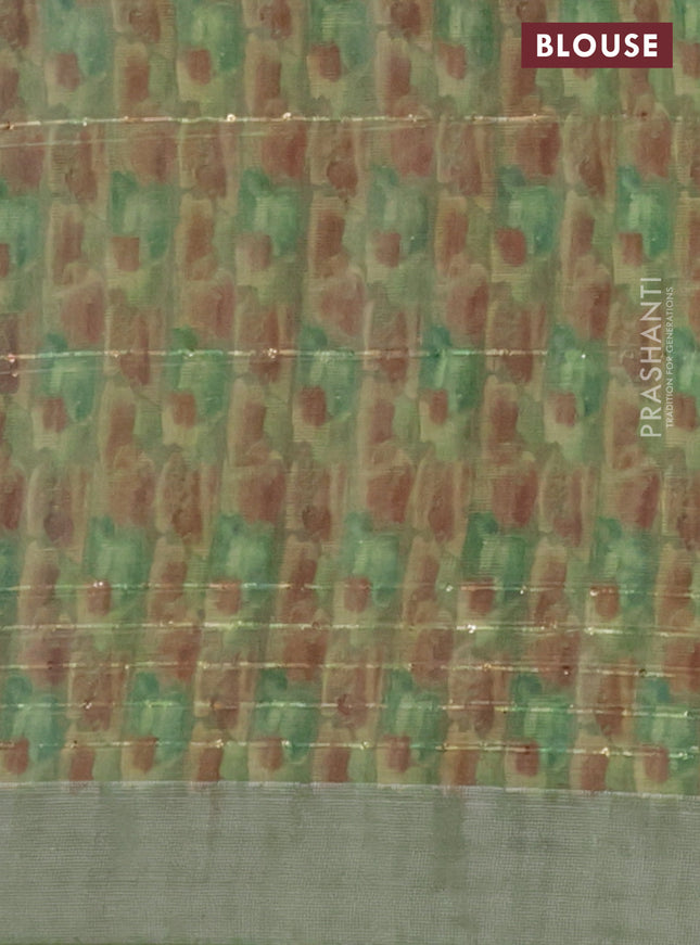 Linen cotton saree light green with floral prints & sequin work and silver zari woven border