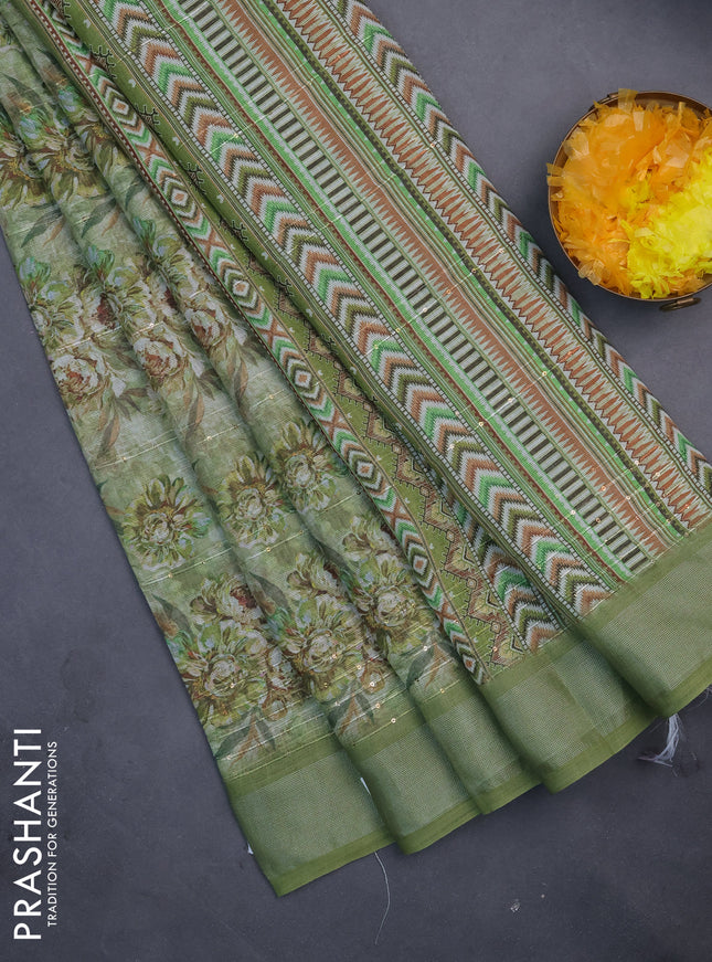 Linen cotton saree sap green with floral prints & sequin work and silver zari woven border