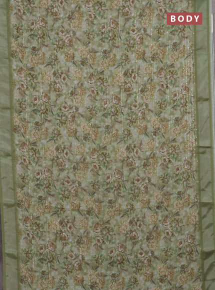 Linen cotton saree sap green with floral prints & sequin work and silver zari woven border