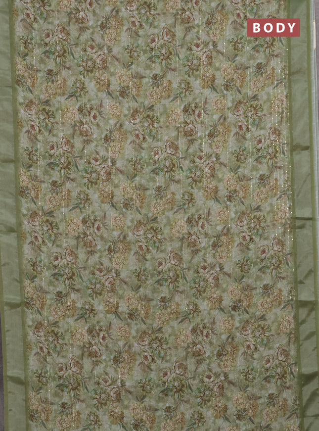 Linen cotton saree sap green with floral prints & sequin work and silver zari woven border