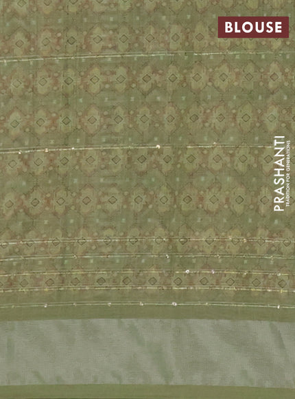 Linen cotton saree sap green with floral prints & sequin work and silver zari woven border