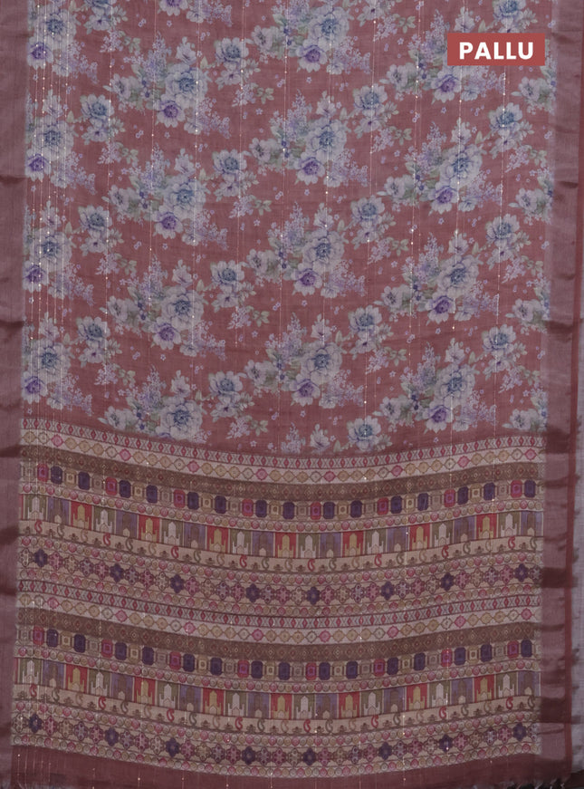 Linen cotton saree rust shade with floral prints & sequin work and silver zari woven border