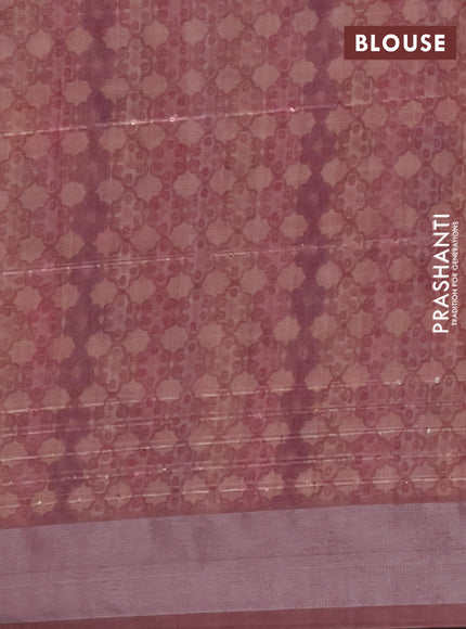 Linen cotton saree rust shade with floral prints & sequin work and silver zari woven border