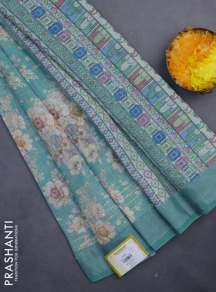 Linen cotton saree teal green with floral prints & sequin work and silver zari woven border