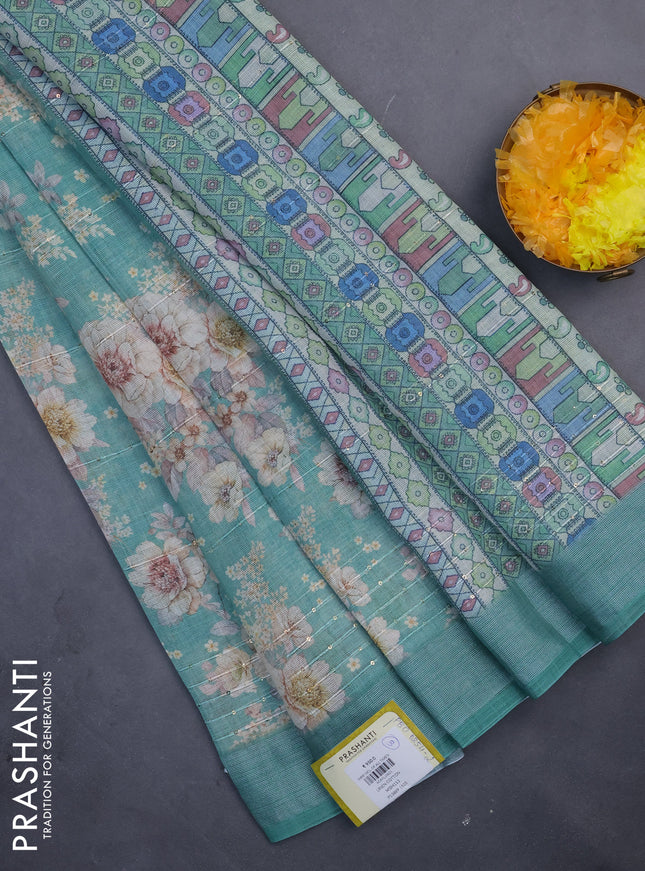 Linen cotton saree teal green with floral prints & sequin work and silver zari woven border