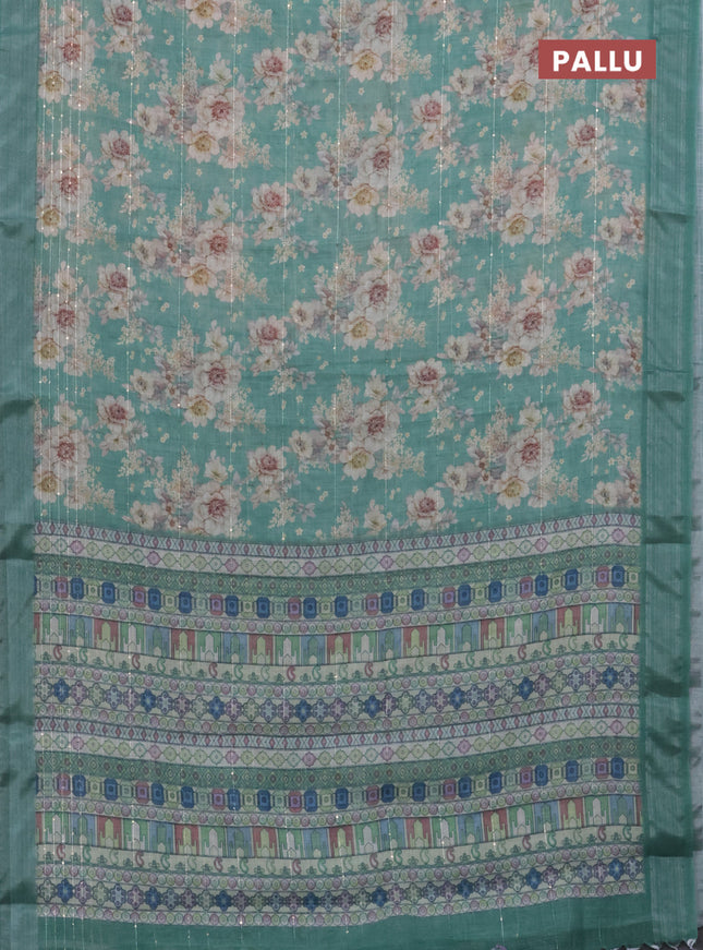 Linen cotton saree teal green with floral prints & sequin work and silver zari woven border