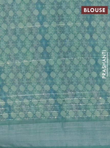 Linen cotton saree teal green with floral prints & sequin work and silver zari woven border