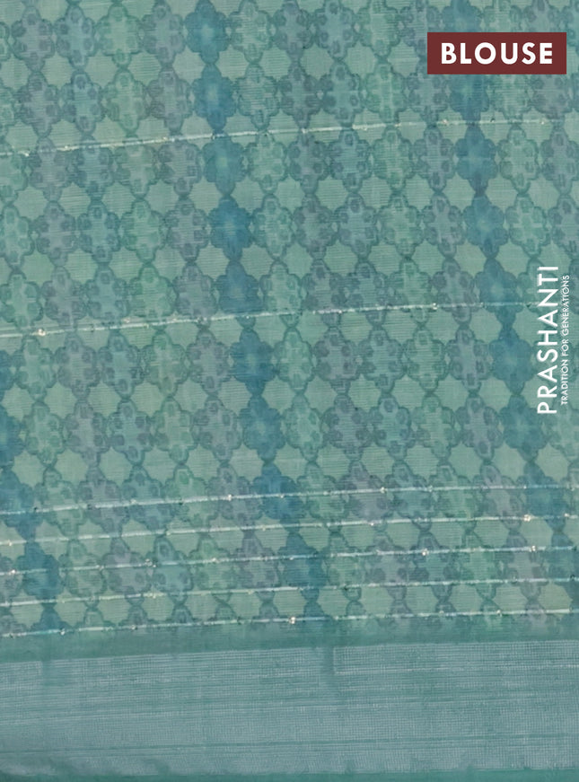 Linen cotton saree teal green with floral prints & sequin work and silver zari woven border