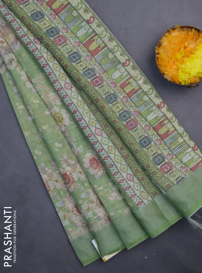 Linen cotton saree green with floral prints & sequin work and silver zari woven border