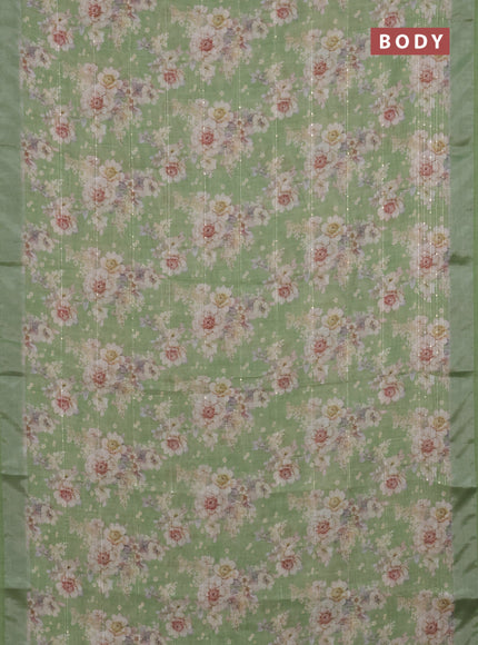 Linen cotton saree green with floral prints & sequin work and silver zari woven border